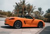 Porsche Boxster (Оранжевый), 2016 для аренды в Дубай 0