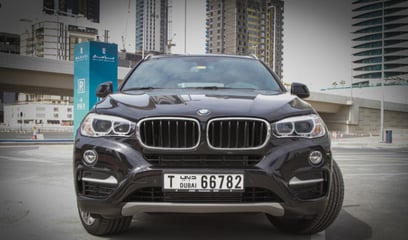 BMW X6 (Черный), 2019 для аренды в Дубай