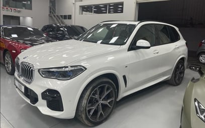 BMW X5 (Белый), 2023 для аренды в Абу-Даби