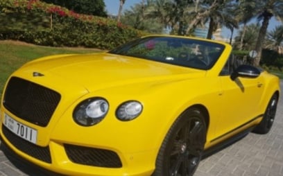 Bentley Continental GTC (Желтый), 2017 для аренды в Дубай