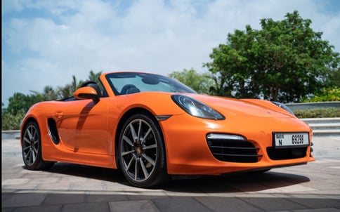 Porsche Boxster (Оранжевый), 2016 для аренды в Дубай